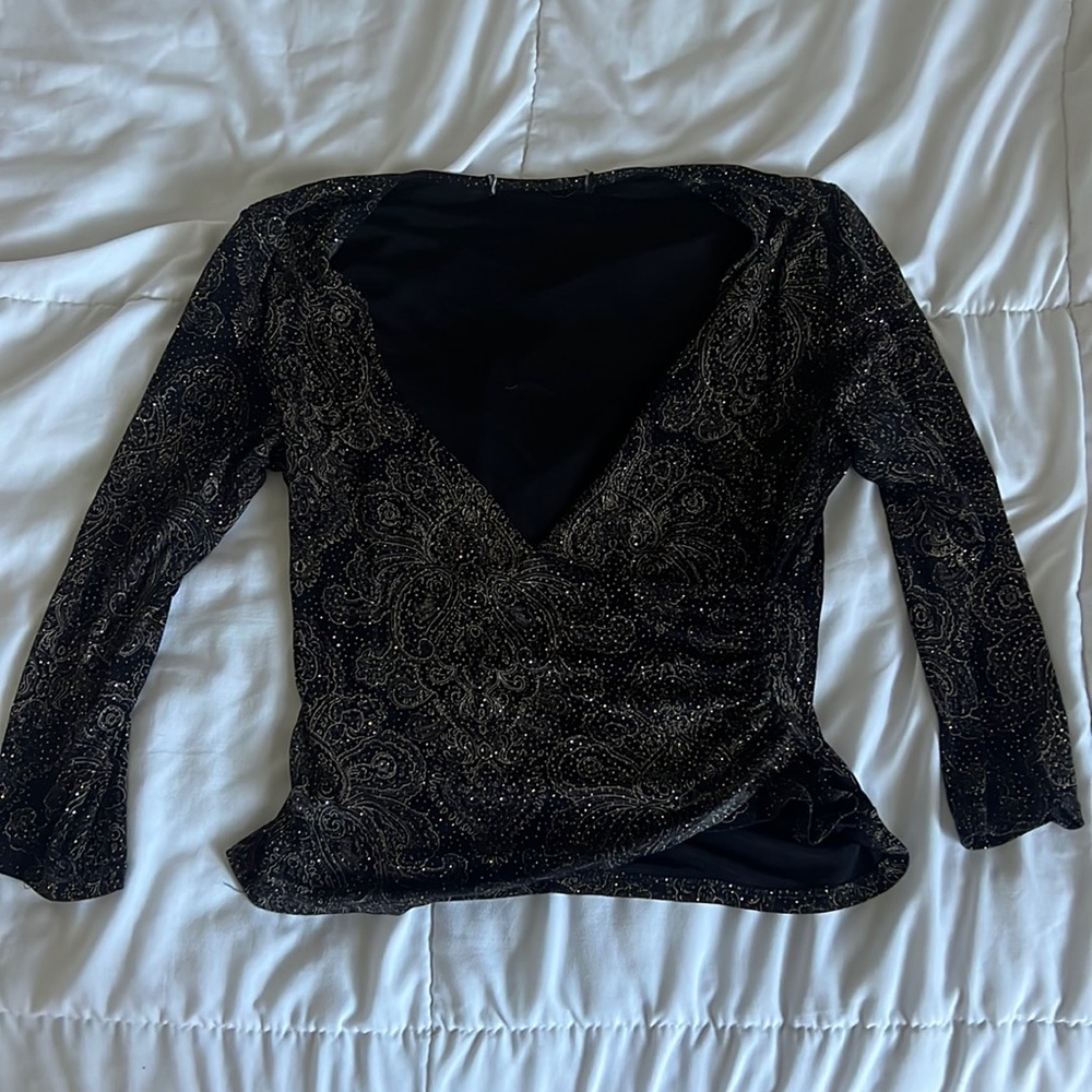 Woman’s glittery blouse